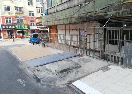 解民忧■违建拆除后路面破损 市政部门及时解民忧