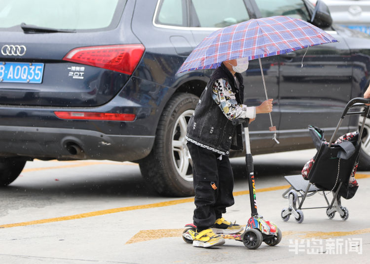 凉意青岛：小雨润如酥 周末添凉意