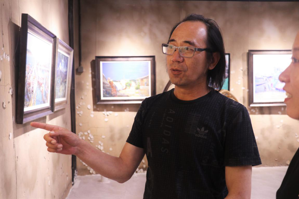威海市举办“精致威海·魅力海洋”主题油画展