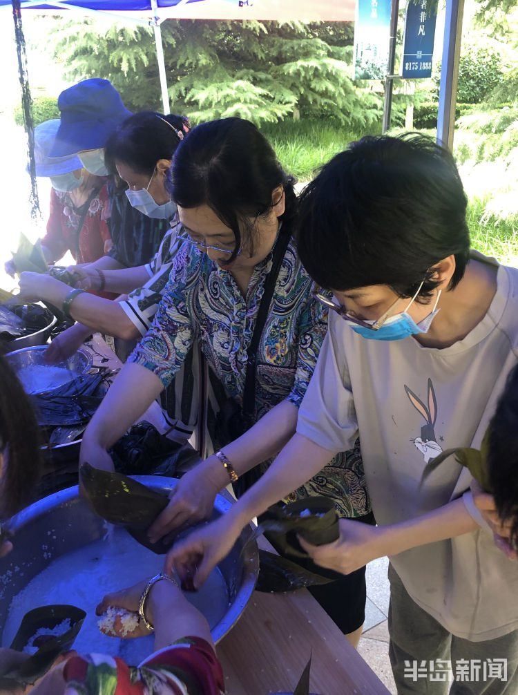 粽叶松岭路迪生山庄小区：粽叶飘香邻里情