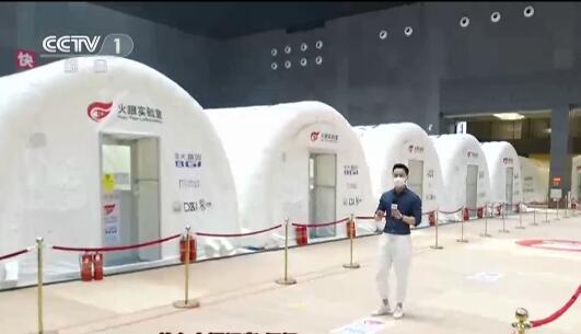 记者探访“火眼”实验室 日均核酸检测样本超10万