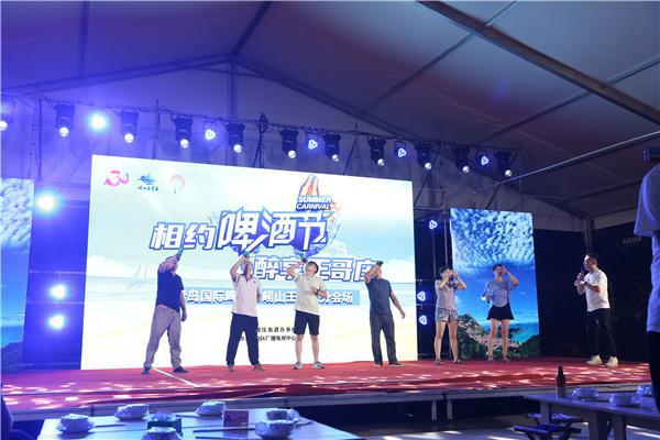 青岛啤酒节|青岛啤酒节王哥庄分会场：道德模范故事汇基层巡演8月16日晚举行