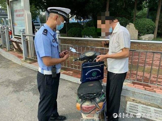 无牌|无牌电动车上路 烟台交警开出首张罚单