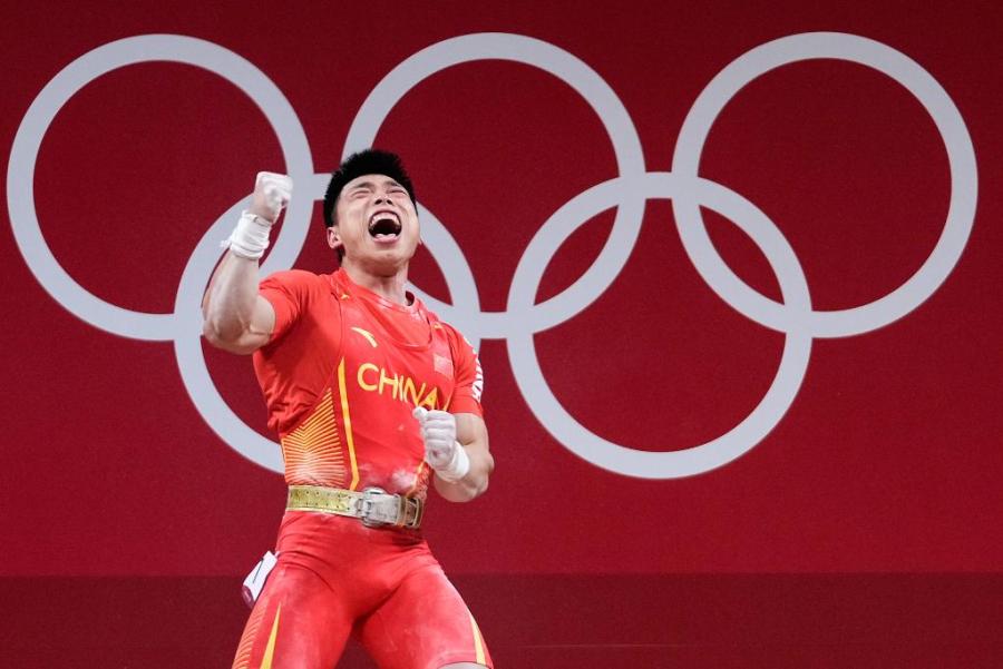 中国举重队东京奥运会强势夺金，谌利军18