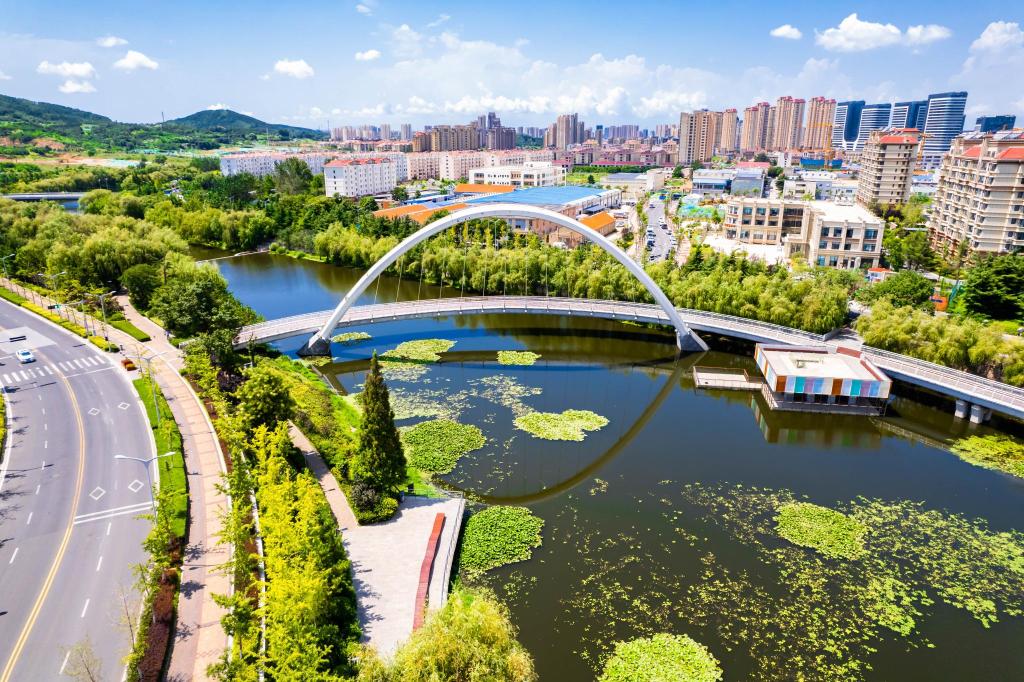 构建生态廊道释放绿色红利李沧区打造生态治河的青岛样本李村河浇灌高