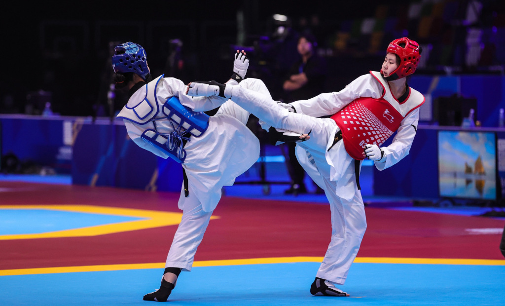 大运赛场再传捷报青岛美女刘军宏角逐跆拳道助力拿下女团金牌